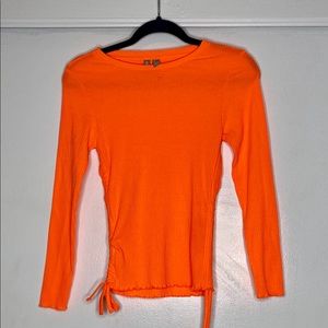 Neon orange long sleeved top